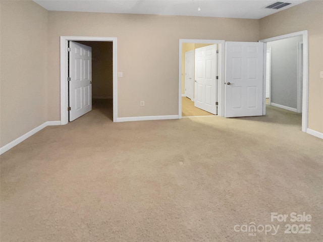 unfurnished bedroom with light carpet