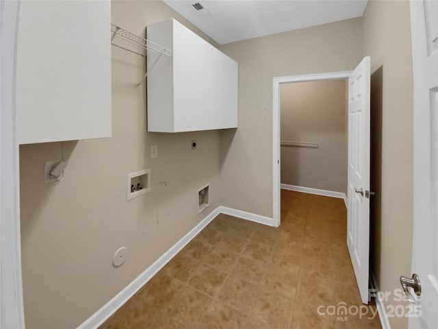 laundry room with washer hookup, hookup for a gas dryer, cabinets, and hookup for an electric dryer