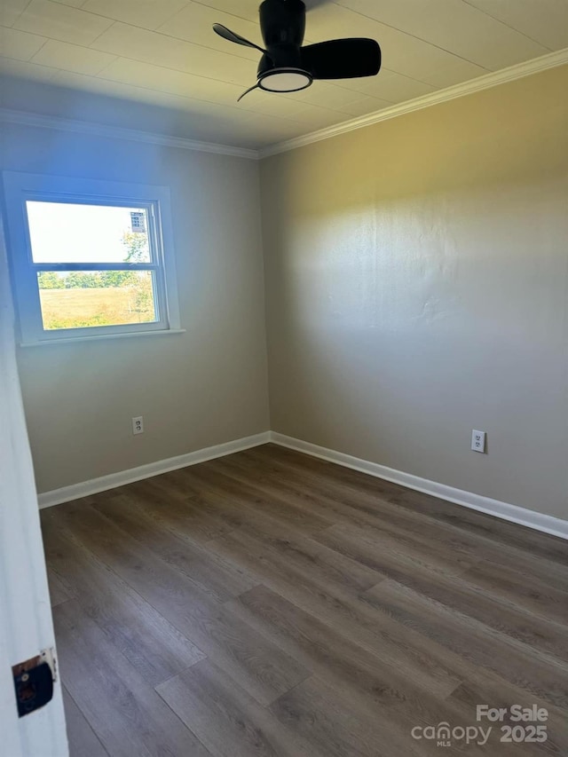 unfurnished room with crown molding, dark hardwood / wood-style floors, and ceiling fan