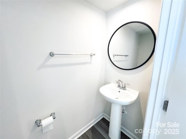 bathroom featuring wood-type flooring