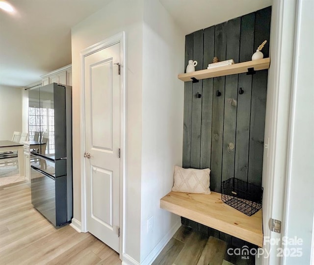 mudroom with hardwood / wood-style floors