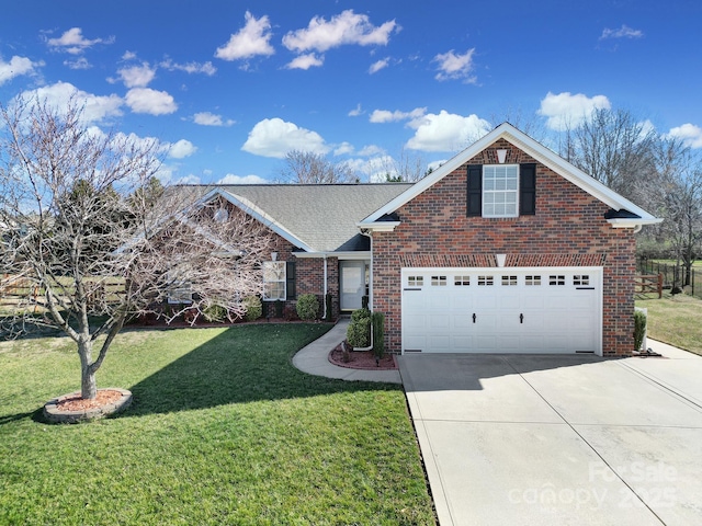 traditional home featuring concrete driveway, brick siding, an attached garage, and a front lawn