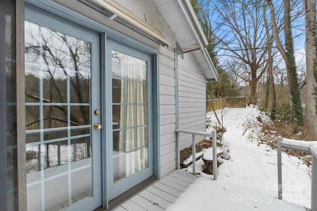 view of snow covered property