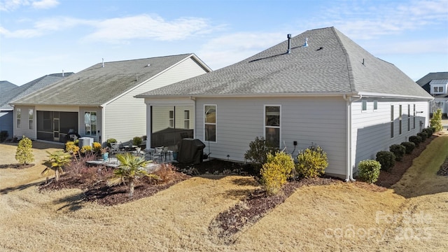 back of house featuring a patio area