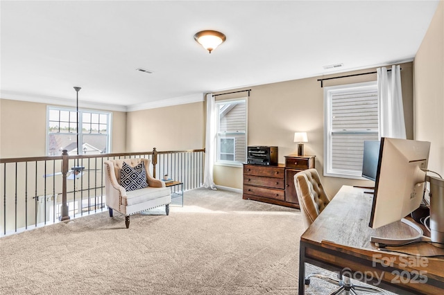 office space with crown molding and light colored carpet