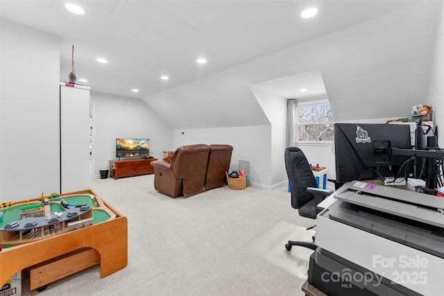 office featuring lofted ceiling and carpet flooring