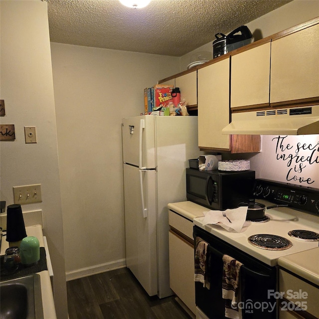 kitchen with range with electric stovetop, white fridge, a textured ceiling, and dark hardwood / wood-style flooring