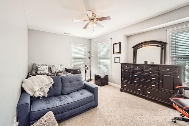 carpeted bedroom featuring ceiling fan