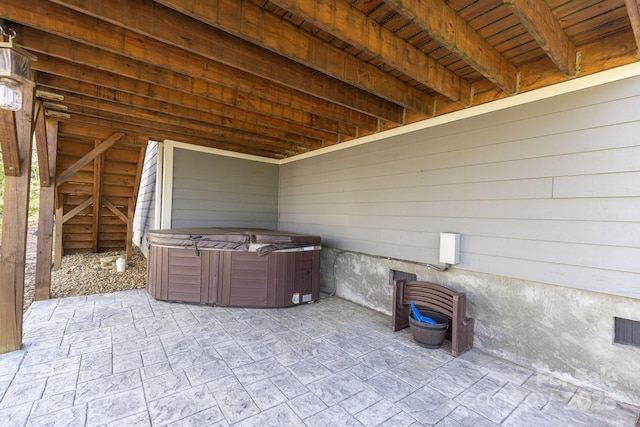 view of patio featuring a hot tub