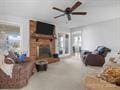 living room with ceiling fan