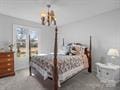 bedroom with a chandelier