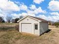 view of outbuilding with a garage