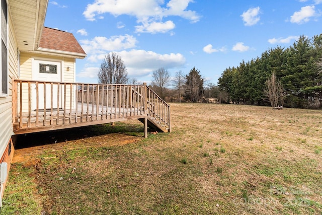 view of yard featuring a wooden deck