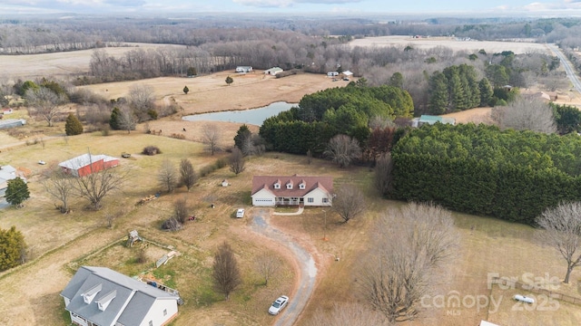 bird's eye view with a water view and a rural view