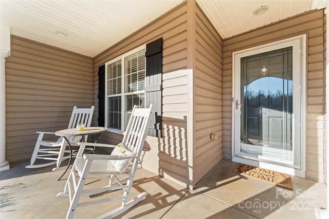 entrance to property with a porch