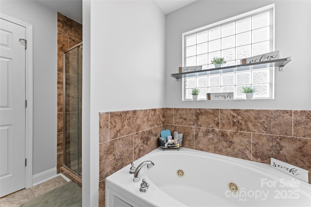 bathroom with shower with separate bathtub