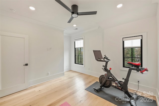 exercise area with recessed lighting, visible vents, ceiling fan, wood finished floors, and baseboards