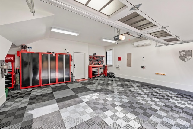 garage featuring a wall mounted AC, electric panel, baseboards, and a garage door opener