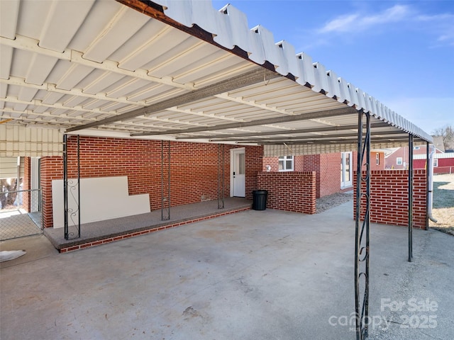 view of patio / terrace featuring a carport