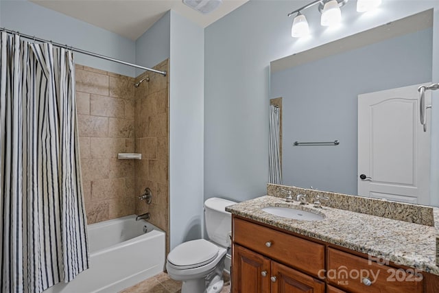 full bathroom featuring shower / bath combo, vanity, tile patterned floors, and toilet