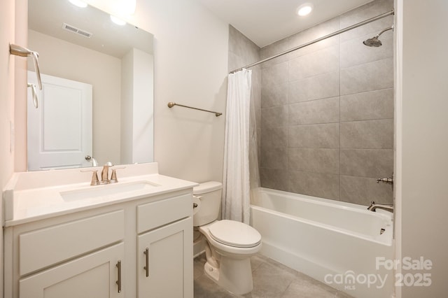 full bathroom featuring toilet, tile patterned floors, shower / bathtub combination with curtain, and vanity