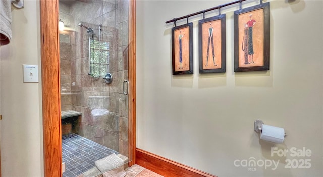 bathroom with a shower stall