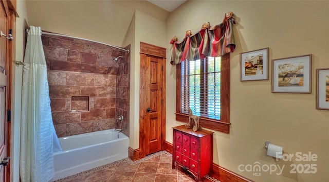 bathroom featuring shower / bath combination with curtain and tile patterned floors