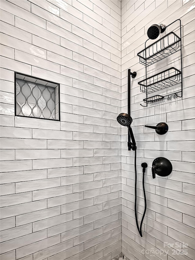 details featuring a tile shower