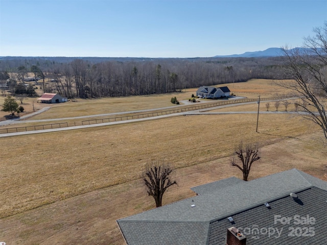 bird's eye view featuring a mountain view and a rural view