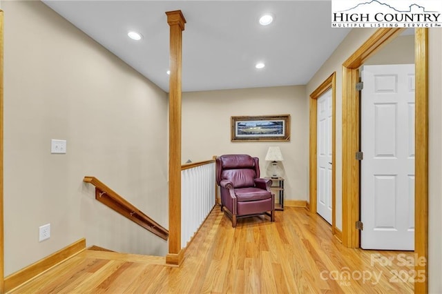 hallway with wood-type flooring