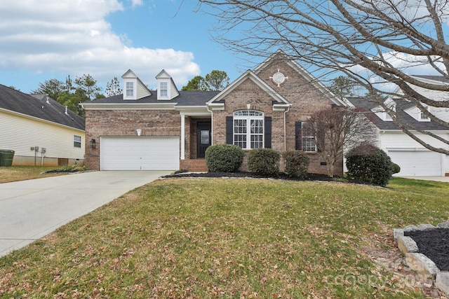 front of property featuring a garage and a front lawn