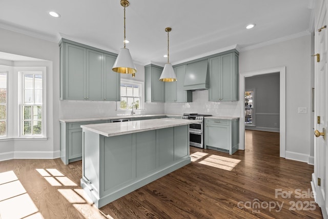 kitchen with crown molding, dark hardwood / wood-style flooring, custom range hood, range with two ovens, and backsplash