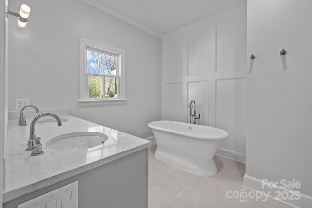 bathroom featuring vanity, a bath, and tile patterned floors