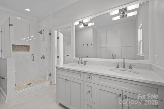 bathroom featuring vanity, tile patterned floors, ornamental molding, and walk in shower