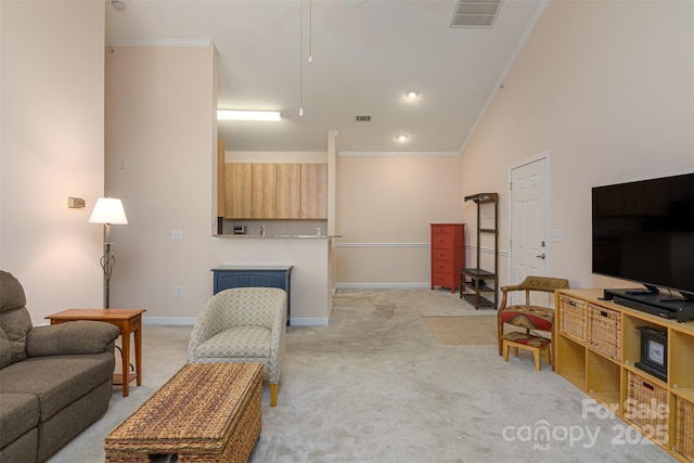 living area featuring baseboards, ornamental molding, visible vents, lofted ceiling, and light colored carpet