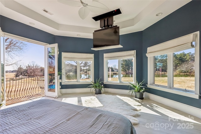 bedroom with access to exterior and ceiling fan