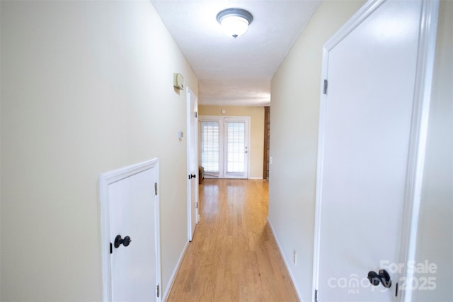 hall featuring light wood-type flooring