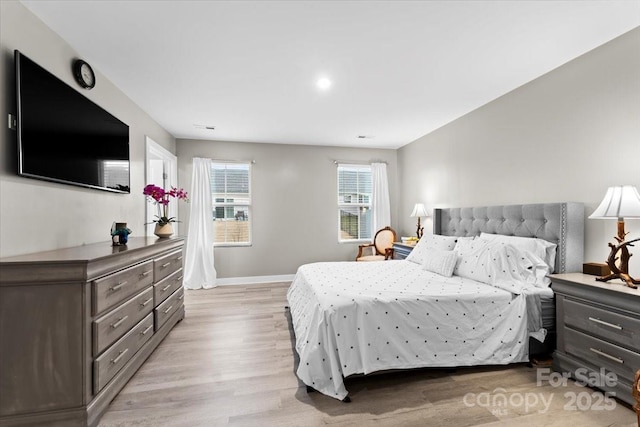 bedroom featuring light hardwood / wood-style flooring