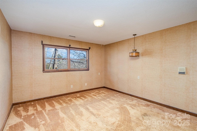 unfurnished room with carpet