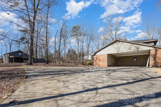 view of side of property with a garage