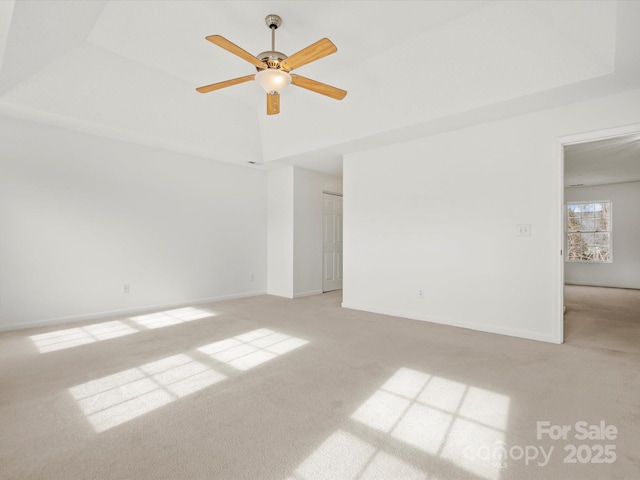 empty room with light carpet and ceiling fan