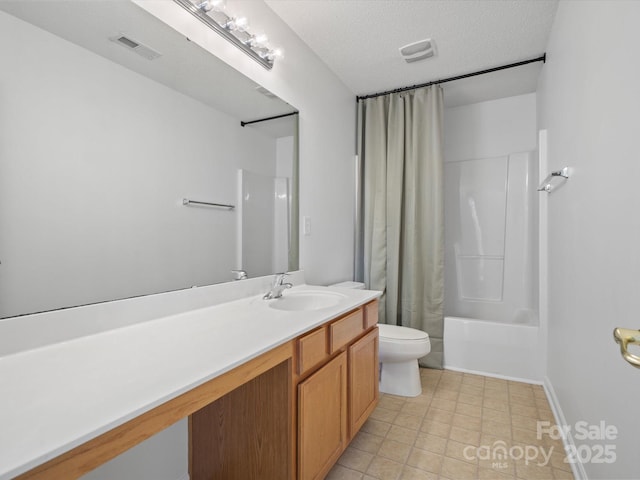 full bathroom featuring vanity, a textured ceiling, toilet, and shower / tub combo with curtain