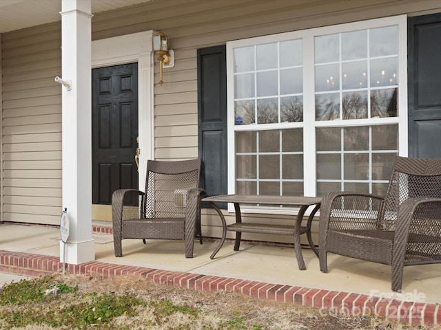 doorway to property with covered porch