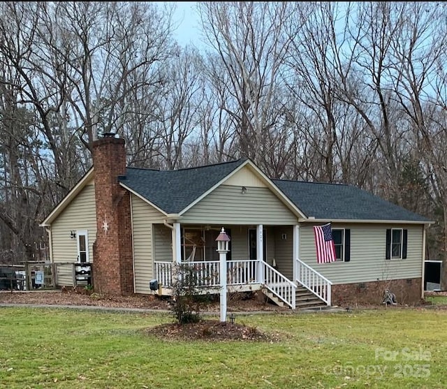 view of front of home featuring a porch and a front yard