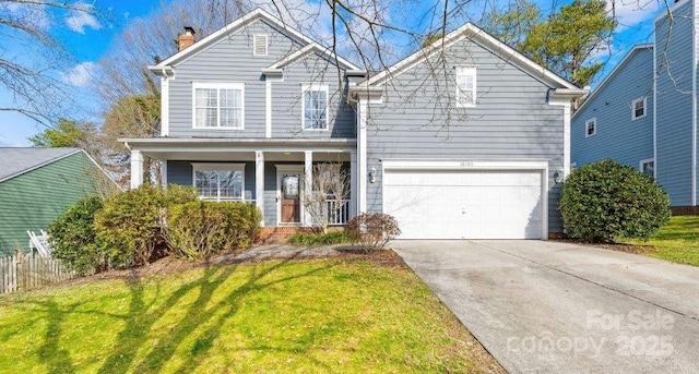 front of property with a garage and a front yard