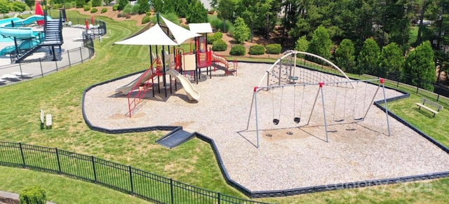 view of playground with a yard