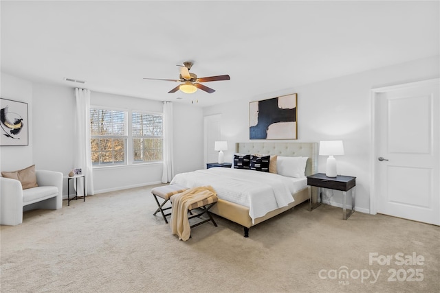 carpeted bedroom featuring ceiling fan