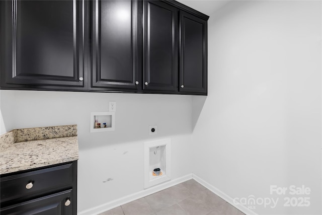 washroom with cabinets, hookup for a washing machine, and electric dryer hookup