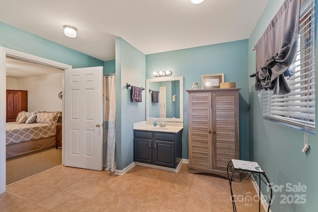 bathroom featuring tile patterned floors and vanity