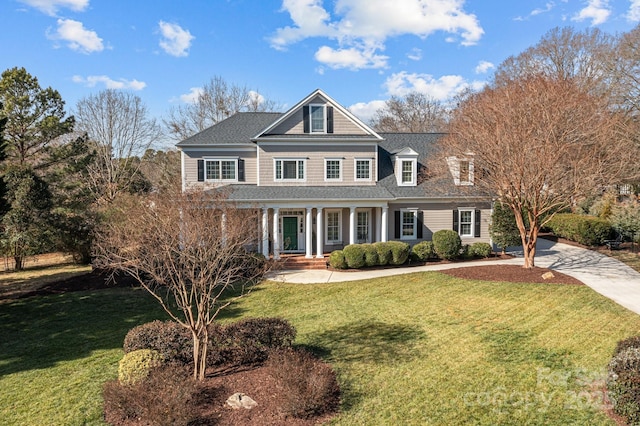 view of front of property with a front lawn